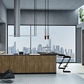 Premiumline kitchen with black handleless profile in walnut woodgrain and dark Graphite matt finish